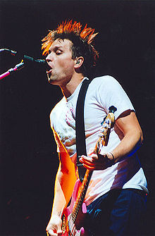 220px-Mark_Hoppus_2004_1021210_0.jpg