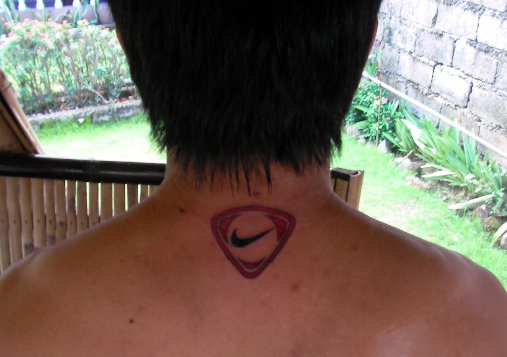 tribal-nike-logo-tattoo-on-back-neck_1263400_0.jpg